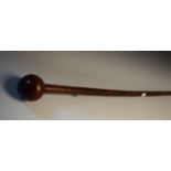 Tribal Art - a Zulu knobkerrie or status staff, typical globular head, 100cm long, c.