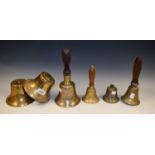 Metalware - Bells - an early 20th century bronzed metal handbell, turned wooden handle, 12.8cm diam.