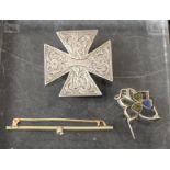 A Victorian silver Maltese cross brooch; a Shamrock brooch;