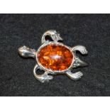 A sterling silver and resin novelty sea turtle brooch,