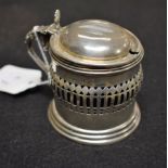 A silver mustard pot,