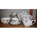 Shelley Queen Anne shaped teaware, comprising teapot (faults), milk jug, sugar basin, teacups,