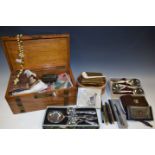 A late 19th century workbox, brass mounted; assorted cottons, needles, crochet hooks,