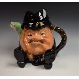 An early 20th century Staffordshire pottery novelty character teapot, as a fisherman,