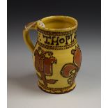 A Stoneware treacle glazed mug,