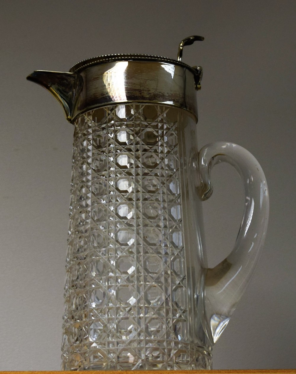 A Victorian EPNS and cut glass jug,