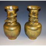A pair of brass Chinese dragon neck vases (2)