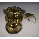 A West African brass tribal mask;