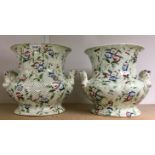 A pair of late 19th century two handled ogee pottery planters, printed with flowers, c.