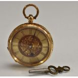 An 18ct gold lady's open face pocket watch, ornate floral gilt dial, Roman numerals,