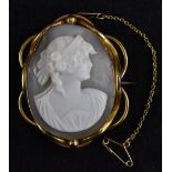 A Victorian 9ct gold mounted carved shell cameo brooch, portrait of a classical maiden,