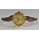 A vintage Thomas Russell & sons 9ct gold cased lady's wristwatch, cream dial, Arabic numerals,