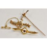 Jewellery - A 15ct gold Fox head and Riding crop tie pin, spiralled shaft, stamped 15ct, 1.