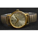 Omega - a vintage gentleman's gold plated wristwatch, silvered dial, block batons, centre seconds,