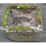 A square hewn stone trough. 34cm high x 66cm.