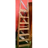 A set of mid 20th century pitch pine step ladders