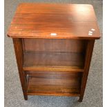 A mahogany double sided bookcase