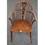 A yew and elm fiddle back Windsor chair.