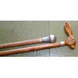 A walking stick, rabbit head handle; another,