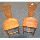 A pair of Monastic oak chairs