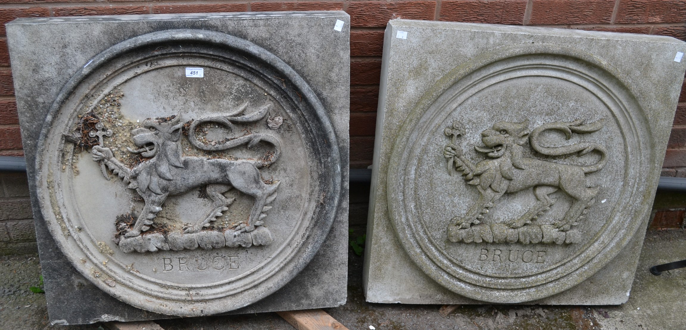 A pair of Baronial composition armorial key stones,
