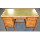 An oak desk, leather top, c.