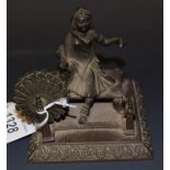 Indian School (19th/early 20th century), a dark patinated bronze, of a lady at a spinning wheel,