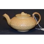 An early 19th century Wedgwood caneware teapot, basket weave moulding,