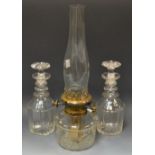 Glass - a Victorian cut glass oil lamp, clear reservoir and chimney,