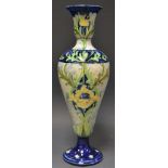 A Moorcroft Macintyre slender inverted baluster pedestal vase tube lined with yellow poppies and