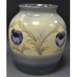 A Moorcroft salt glazed Poppy pattern ovoid vase, tube lined with poppies and sinuous foliage,