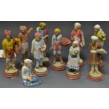 A set of ten Indian plaster figures, including a Maharaja, Bread seller, Servant, others,