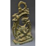 A 19th century bronze country house door stop, cast with a fox mask and hunting regalia,