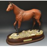 A Royal Doulton Connoisseur model, Red Rum, wooden plinth, limited edition 328/7,