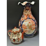 Oriental Ceramics - a Cantonese baluster shaped vase,