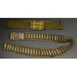 A white metal nurses belt, 72cm long; another,