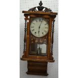 A Victorian walnut and marquetry wall clock.