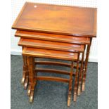 A reproduction yew wood quartetto of tables