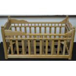 A Victorian pine doll's cot.