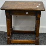 An oak stool, moulded top,