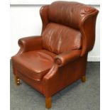 A Wade leather recliner wingback armchair.