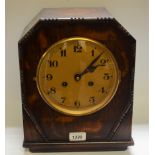 An early 20th century oak cased striking mantel clock, gilt dial, Arabic numerals,