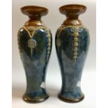 A pair of Royal Doulton baluster vases, impressed 7574,