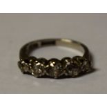 A five stone diamond line ring, inset with five graduated old cut diamonds,