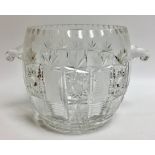 A large cut glass ice bucket,