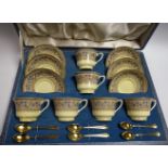 A Royal Worcester Lady Evelyn pattern coffee service, for six, six gilt coffee spoons ensuite,