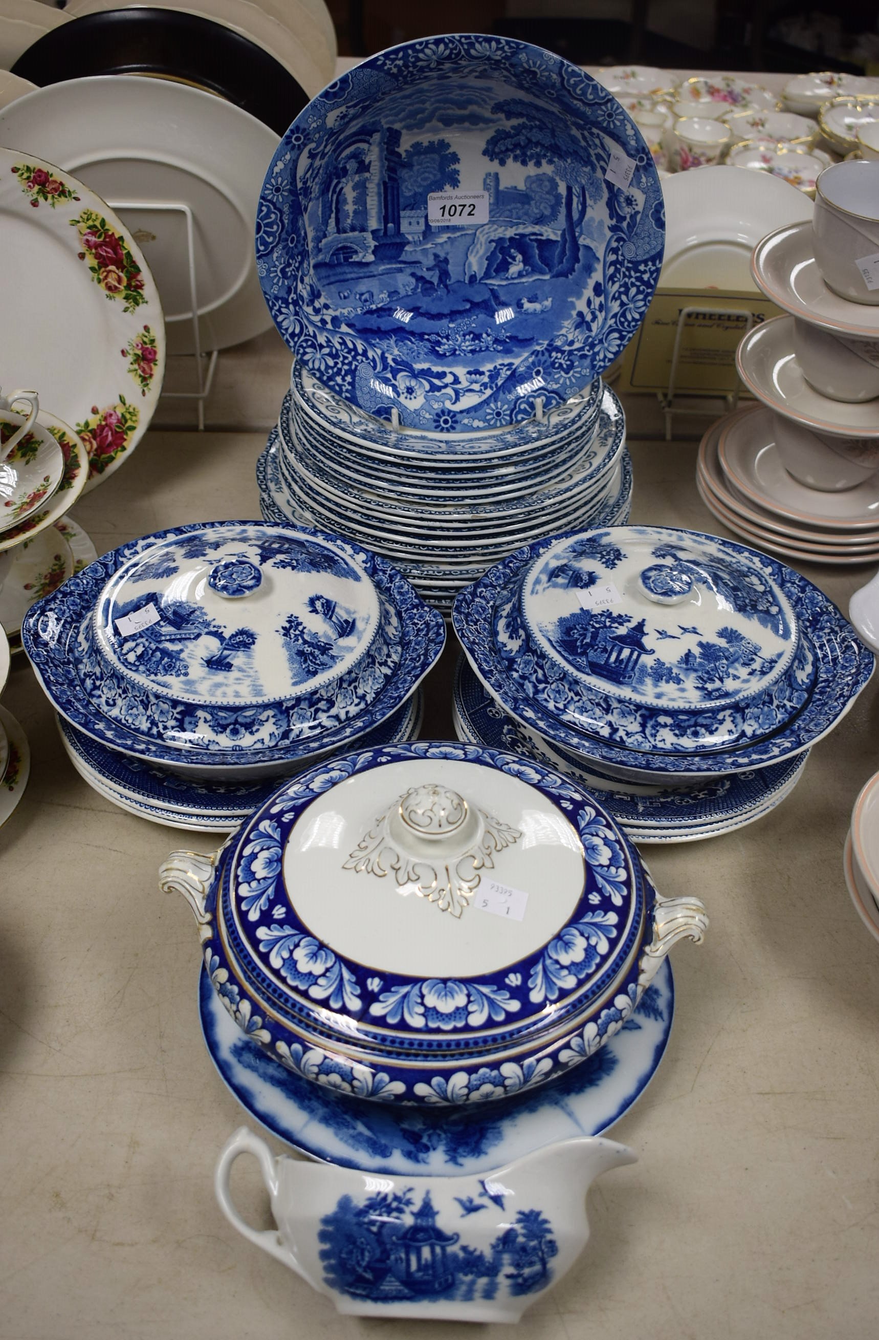 Ceramics - a pair of blue and white tureens and covers;