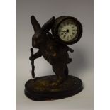 A bronzed rabbit clock