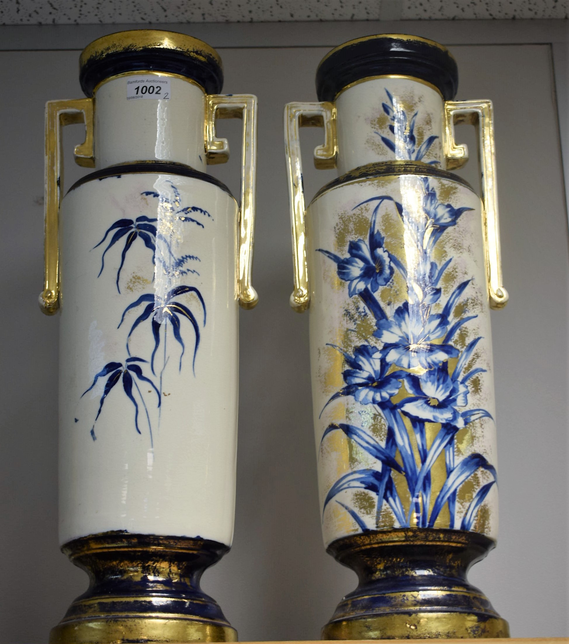 A pair of large late Victorian cylindrical two handled vases,