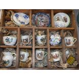 A pine box, subdivided, containing a quantity of children's ceramics,